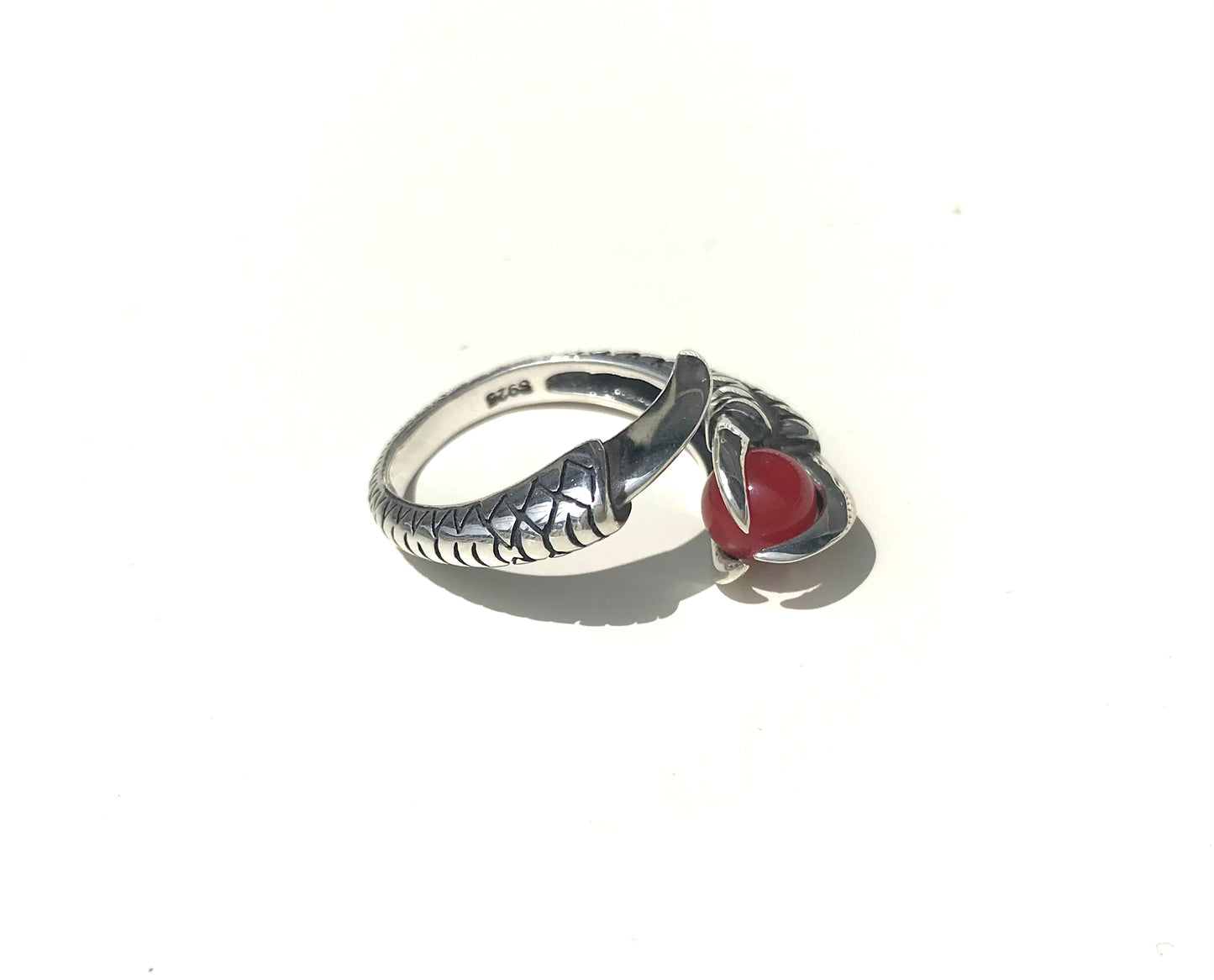 Blood red coral silver dragon claw ring