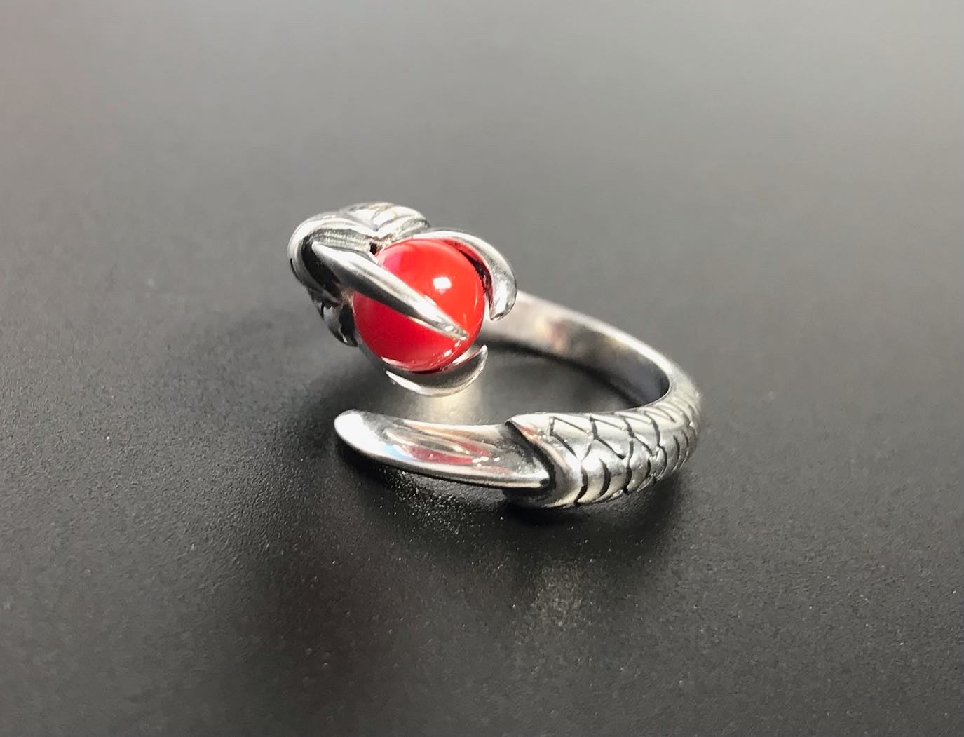 Blood red coral silver dragon claw ring