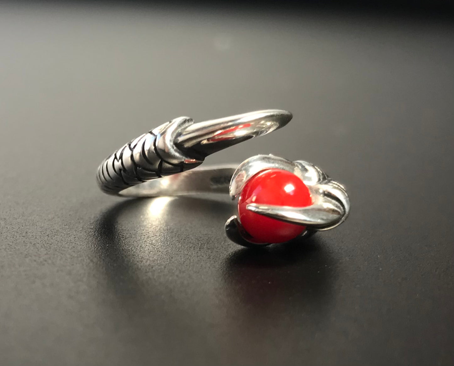 Blood red coral silver dragon claw ring