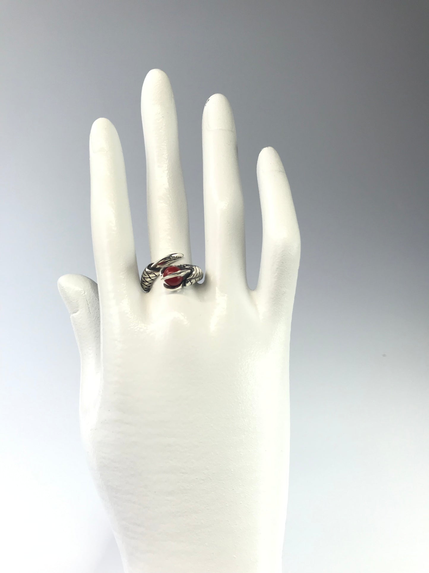 Blood red coral silver dragon claw ring