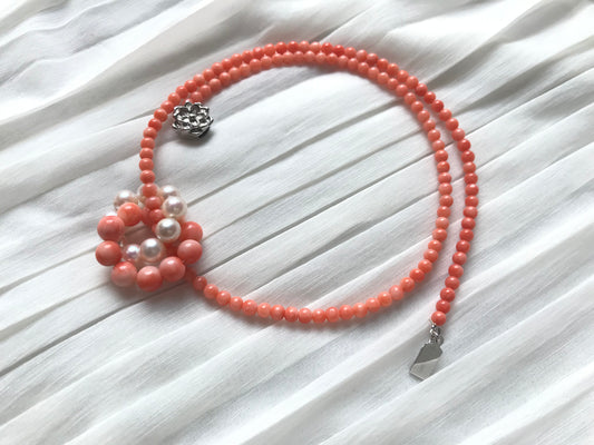 Pink coral and Akoya pearl interlocking circles pendant