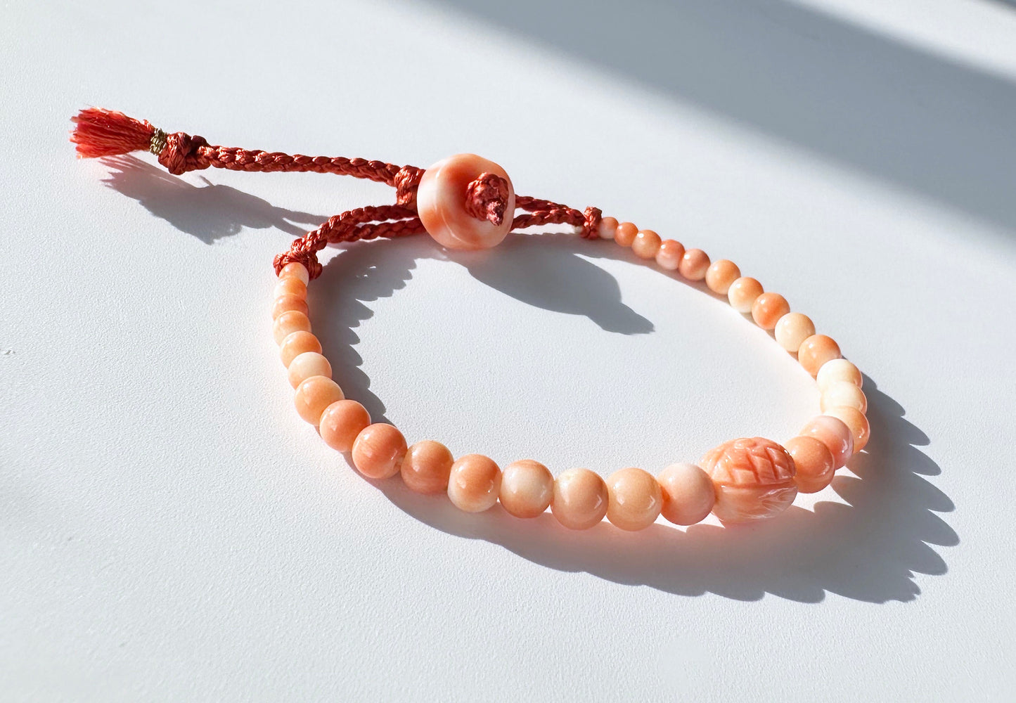 Angel skin Momo coral silk Haorihimo bracelet